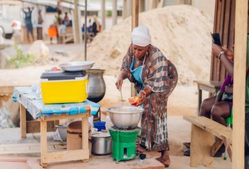 woman cooking with BOJA Cookstove